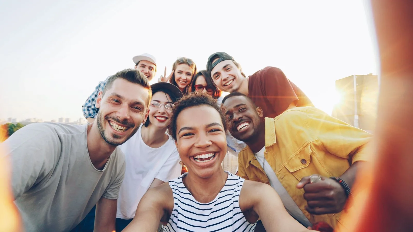 A diverse group of friends smiling together