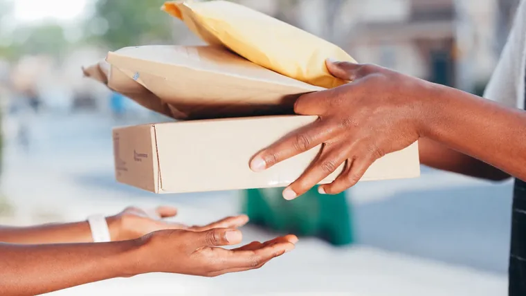 Package being delivered by hand