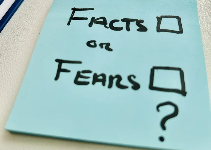 Sticky note asking: facts or fears?